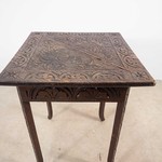 Антикварный столик с резным декором 1890-х гг. 