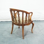 Антикварное кресло с ажурной спинкой 1880-х гг.