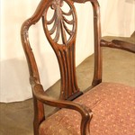 Антикварное кресло с фигурной спинкой 1900-х гг. 