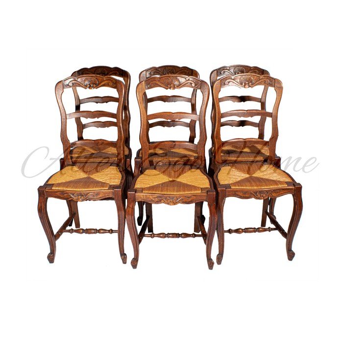 Комплект антикварных стульев с ротанговыми вставками