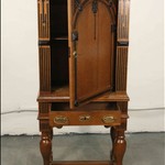 Антикварный шкаф с арочным резным убранством на высоких ножках 1860-х гг.  