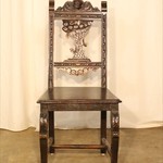 Комплект из антикварных стульев из каштана с резной спинкой 1910-х гг. 