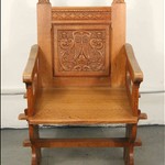 Антикварное дубовое кресло в архаичной стилистике 1920-х гг. 