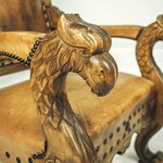 Кресло в эклектическом стиле с подлокотниками в виде резных голов мифологических животных