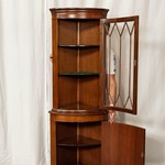 Антикварный угловой шкаф с фигурной расстекловкой 1950-х гг. 
