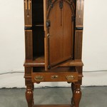 Антикварный шкаф с арочным резным убранством на высоких ножках 1860-х гг.  