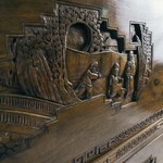 Стол-бюро в классическом стиле с резным орнаментом в виде жанровой сценки