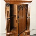 Антикварный шкаф с арочным резным убранством на высоких ножках 1860-х гг.  