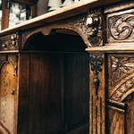Стол письменный в стиле историзма с арочной резьбой на дверцах