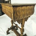 Столик для рукоделия со столешницей украшенной растительной резьбой
