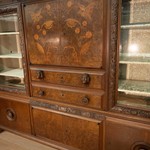 Старинный книжный шкаф с интарсией и резными деталями