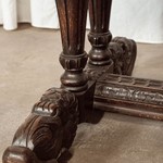 Антикварный стол темного дуба с рельефной резьбой 1860-х гг. 