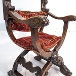 Антикварное курульное кресло с маскаронами