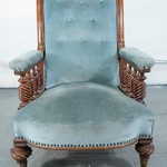 Низкое кресло со спинкой капитоне 1860-х гг.