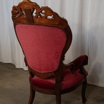 Антикварное кресло с массивным резным навершием в стиле неорококо 1850-х гг. 