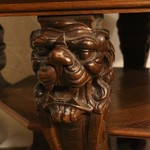 Антикварный столик с резными маскаронами 1900-х гг. 