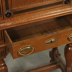 Антикварный шкаф с арочным резным убранством на высоких ножках 1860-х гг.  