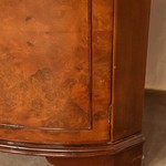 Антикварный угловой шкаф с фигурной расстекловкой 1950-х гг. 
