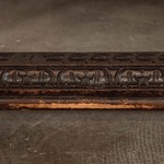 Антикварный стол темного дуба с рельефной резьбой 1860-х гг. 