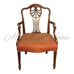 Антикварное кресло с фигурной спинкой 1900-х гг. 