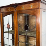 Антикварный шкаф-витрина с фигурной расстекловкой  1880-х гг.