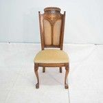 Старинные стулья с ротанговыми спинками и фигурными навершиями 1950-х гг.